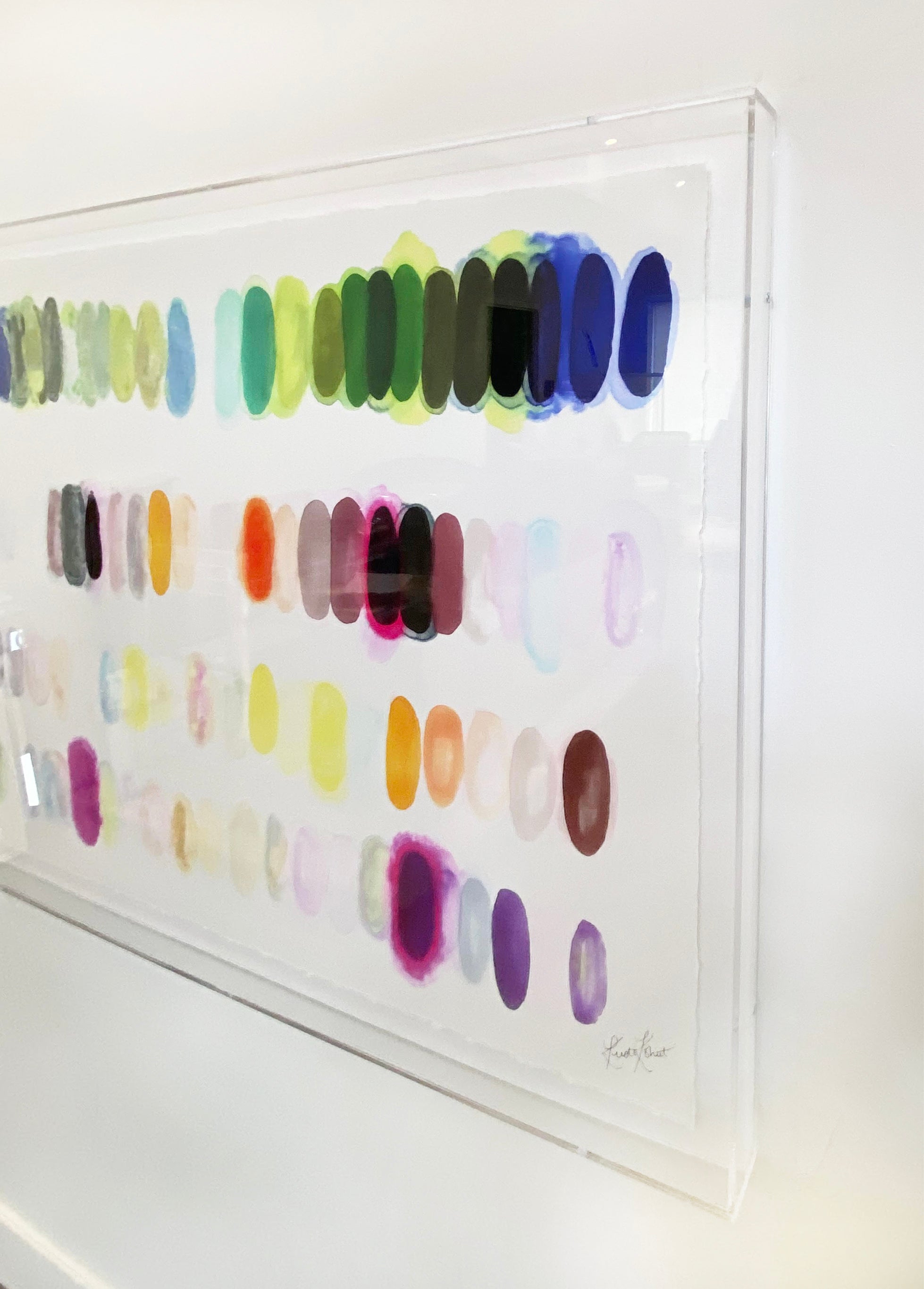 Framed in museum-quality lucite